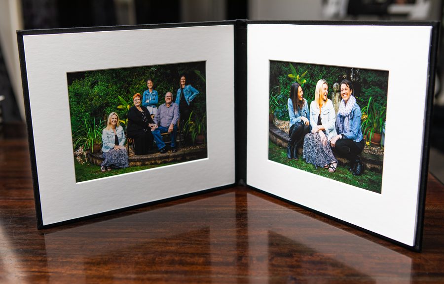 A Portrait Duo folder with two fine art prints