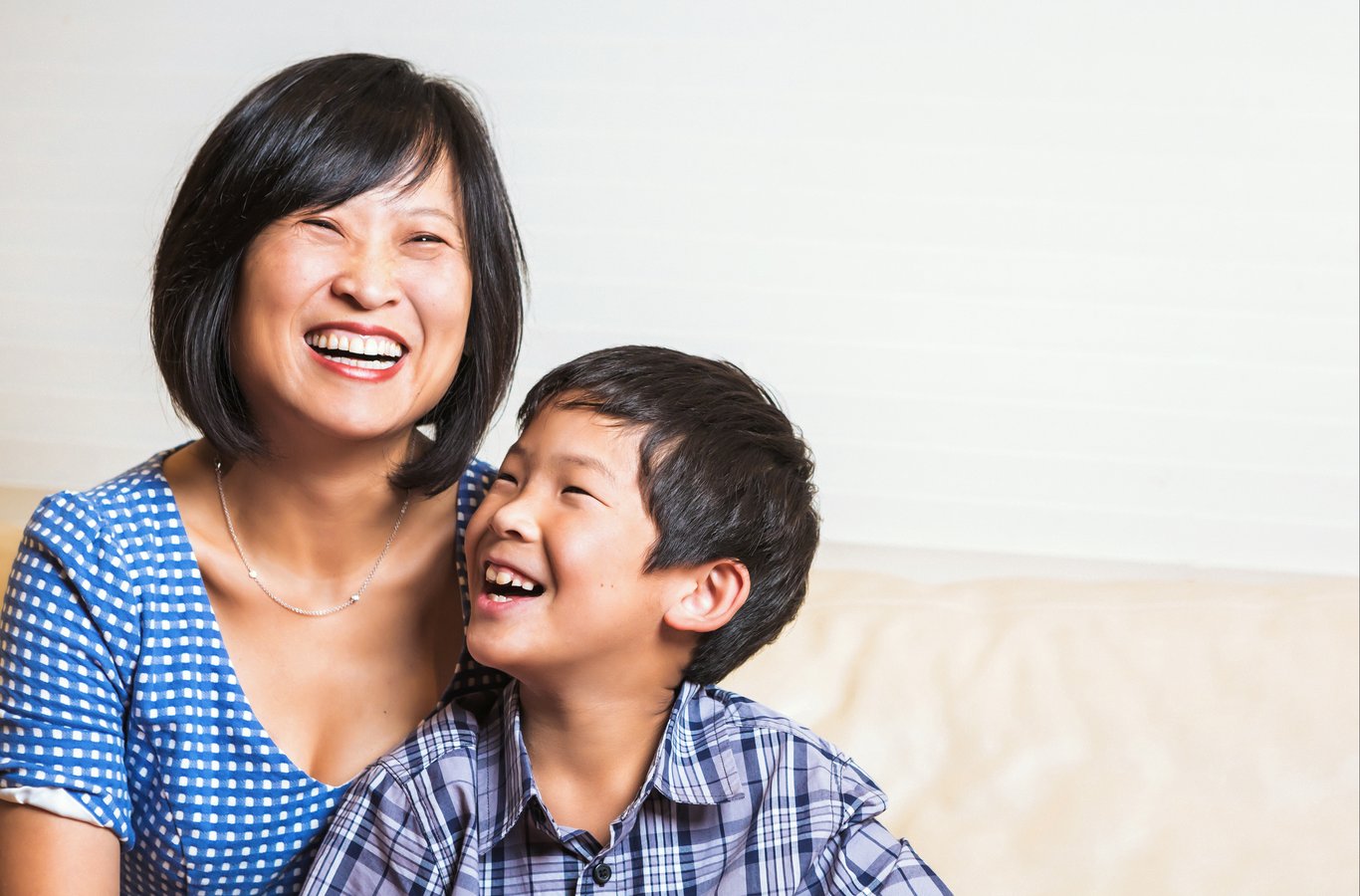 Mother and child intimate moment captured with genuine joy